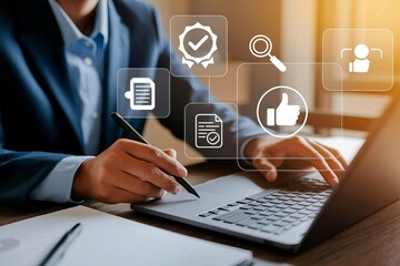 Businessperson working on laptop with digital quality assurance and approval icons.