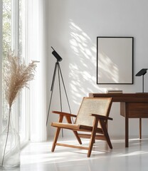 Sunlit minimalist home office with mid-century modern wooden chair, desk, pampas grass, and framed artwork