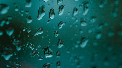 Raindrops on the mirror with macro ,reflecting the reflection