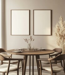 Minimalist dining room with wooden table, four chairs, two blank frames, pampas grass, and subtle natural light