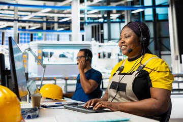 Solar energy female employee providing remote support in solar panel plant, working in customer...