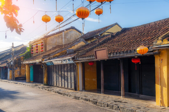 streets with traditional ancient  houses and buildings in the old town in Hoi An city in Vietnam.