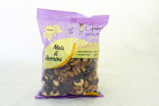 Johannesburg, South Africa - a bag of nuts and berries from Gaby's Earth Foods isolated on a clear background with copy space