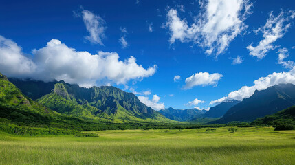 Fototapeta premium Breathtaking Landscape of Lush Mountains Under Blue Sky with Fluffy White Clouds and Vibrant Green Fields during Daylight