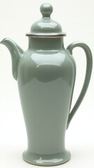 Fototapeta premium Elegant green ceramic coffee pot with a smooth finish and stylish design