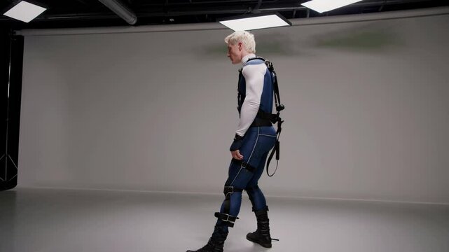 Superhero stuntman preparing on green screen and white background