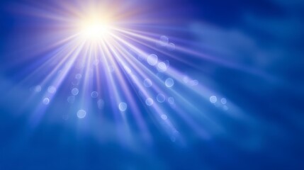 Obraz premium Heavenly Light Rays Bright Blue Sky Sunburst Bokeh Background