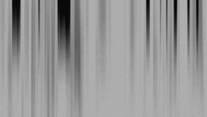 Obraz premium Monochrome abstract background with blurred vertical lines that creates a sense of speed or modern texture.