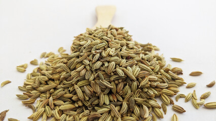 On a white background, fennel seeds
