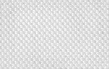 Close-up of white woven satin fabric background.