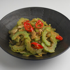 Bitter gourd or bitter melon on white background
