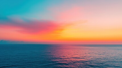 Obraz premium Breathtaking sunset over a tranquil ocean, creating a vibrant gradient sky with ample negative space, perfect for modern design projects