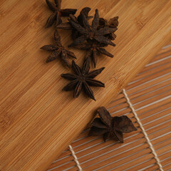 Star anise on wooden background