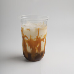 Milk coffee in a cup on white background