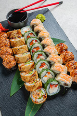 Colorful sushi platter arranged beautifully with diverse fillings—ideal for sharing