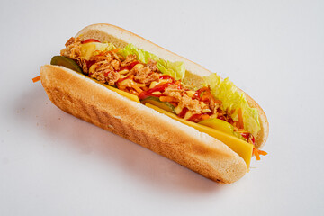 A tasty sandwich packed with crunchy pickles, fresh lettuce, and flavorful toppings