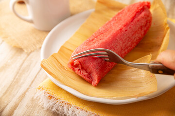 Sweet Tamale. hispanic dish typical of Mexico and some Latin American countries. Corn dough wrapped...