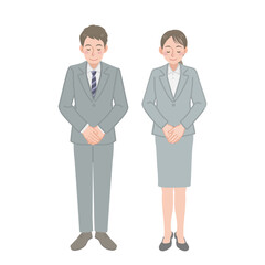 お辞儀をするビジネスパーソンの男女