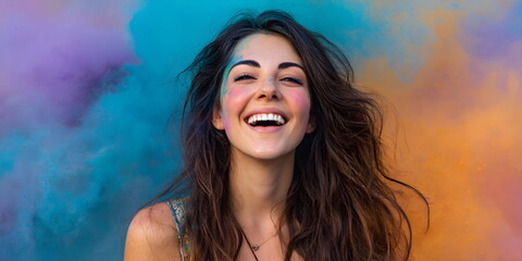Young woman with powder paint on her cheek smiling. Happy girl celebrating Holi festival. Celebration of Indian culture.