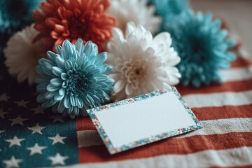 "Blank card on American flag with festive floral decor - perfect for logo placement"

