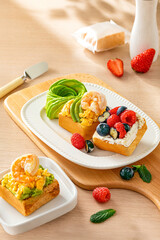 Butter, bread, milk and fruit are a healthy breakfast combination with balanced nutrition.