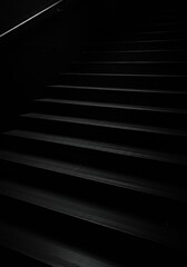 Obraz premium Monochrome Photo of Black Staircase with Shadows and Geometric Lines Abstract