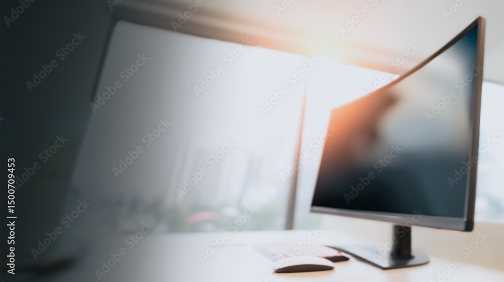 Poster digital workspace: the image showcases a modern workspace, the sleek display screen dominating the s