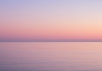 Photo A Serene Sunset Over The Sea Displaying Pink And Purple Hues