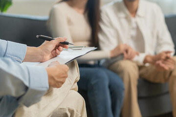 Spouses relationship consultant concept, Married couple listen to psychologist  during therapy talk...