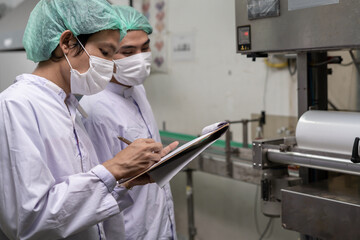 quality supervisor or food or beverages technician inspection about condition control food or...