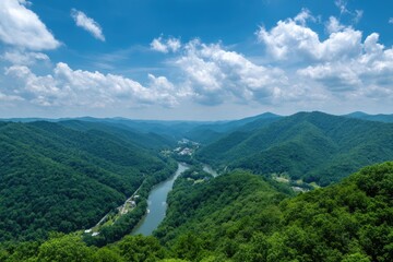 Serene River Valley Underneath Cloudy Blue Skies