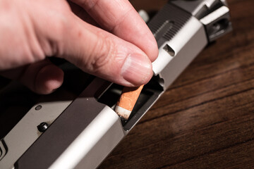 Burning cigarette with smoke and concept of cigarettes 