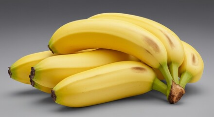 Photo of a Bunch of Ripe Yellow Bananas Isolated on a Gray Background