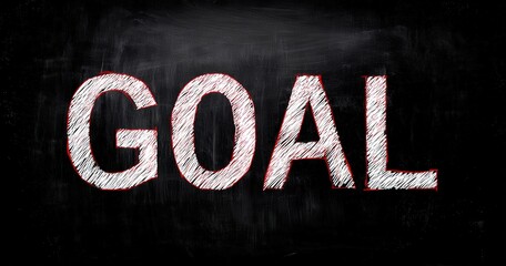 Chalk writing of 'GOAL' on a blackboard.