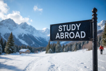 sign that says study abroad in front of a snowy mountain