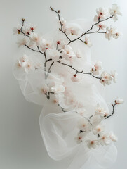 elegant ikebana arrangement, which is a traditional Japanese art form of flower arranging. 