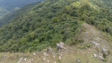 Woman travel  hiker adventure relax after walking on mountain nature landscape and camping outdoors