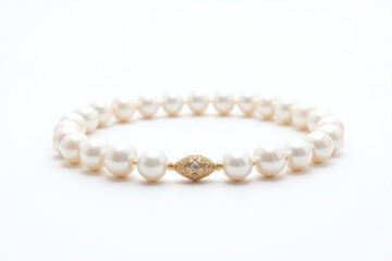 Obraz premium single strand of white pearls on a white background 2