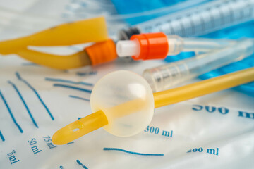 Foley catheter and urine drainage bag collect urine for disability or patient in hospital.