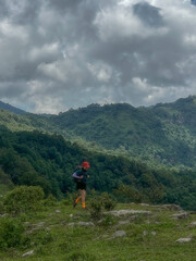 Fototapeta premium Woman travel hiker adventure relax after walking on mountain nature landscape and camping outdoors