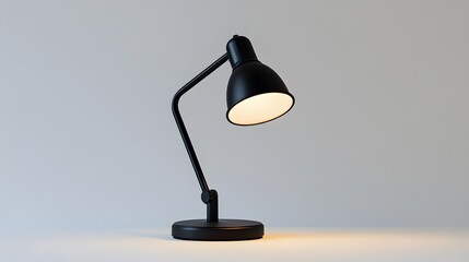 LED desk lamp with flexible neck isolated on white a light gray background.