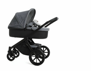 Stylish baby stroller with plush toy, set against a minimalist background, ideal for modern parenting visuals