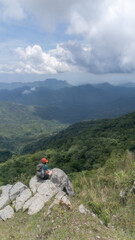 Woman travel  hiker adventure relax after walking on mountain nature landscape and camping outdoors