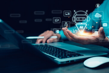 Artificial intelligence technology concept. Businessman using AI chatbot interface on laptop for automation, cloud computing, data security, and smart business solutions.