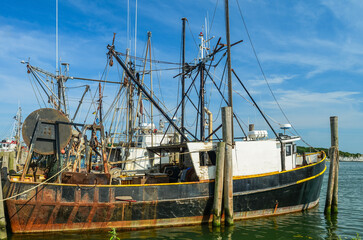 Old fishing cutter in the harbor of Montauk on Long Island, New York, USA