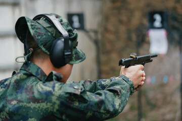 Gun Shooting Practice with Hearing Protection Gear