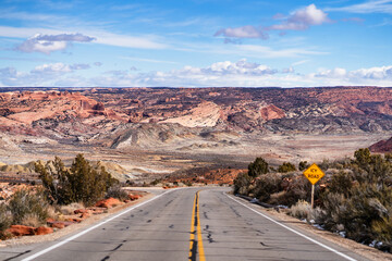 Scenic Winding Road Through Red Rock Canyons and Sandstone Forma