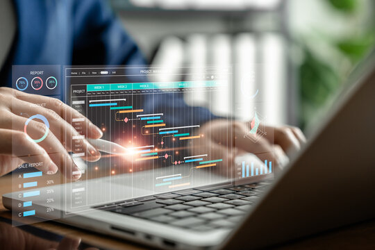 Project Management Software Interface with Gantt Chart Timeline Displayed on Laptop, Businesswoman Planning Tasks and Schedules in a Digital Workflow for Efficient Team Collaboration and Productivity