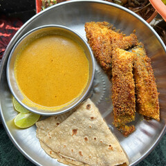 Traditional Maharashtrian Fish Thali with Pomfret Fry, Chapati and Curry