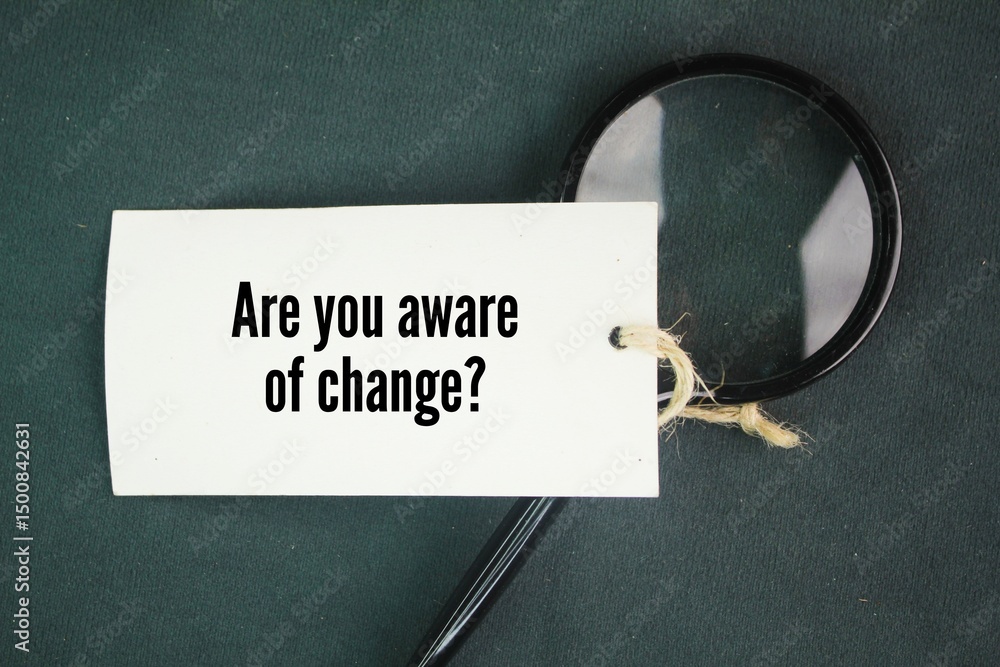 Poster magnifying glass and paper tag with the question words are you aware of change?